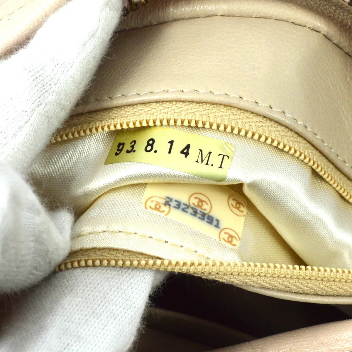 Chanel 1991-1994 Pink Lambskin Mini Vertical Pocket Camera Bag